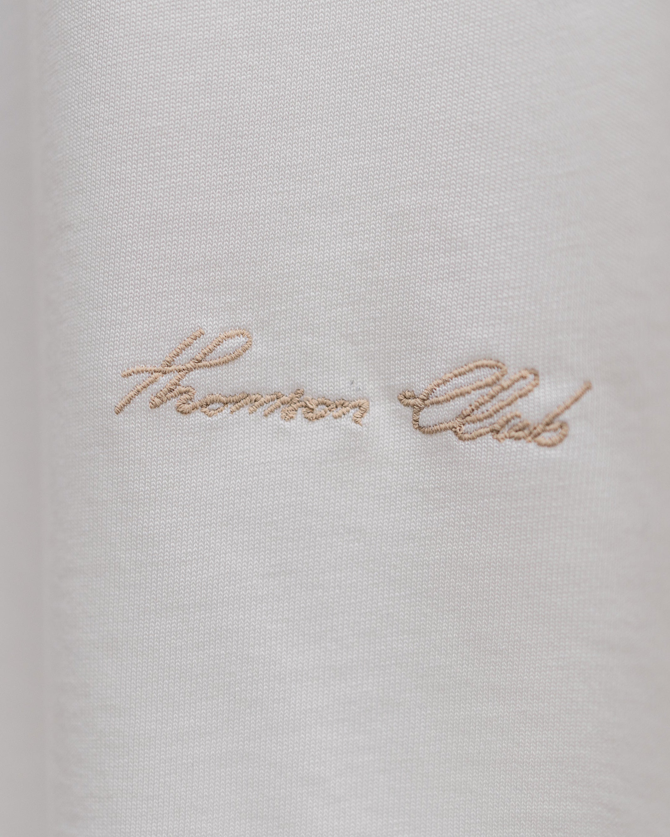 The Balancing Art T-shirt – Cream White.